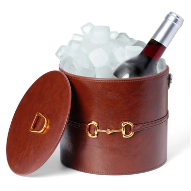 Brown faux leather ice bucket with lid opened, gold-tone buckle latch and handle.