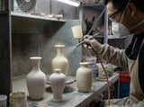 crystalline glaze mini vases revealed together inside a Jingdezhen porcelain kiln glaze