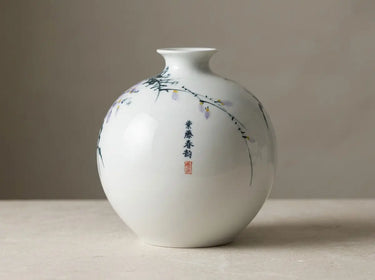 Wisteria Reverie porcelain vase showing hand-painted foliage, Chinese calligraphy and a red seal