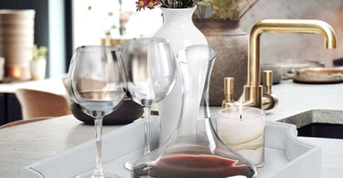 Shagreen vegan leather decorative tray with scalloped edges and acrylic handles, styled on a modern coffee table