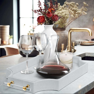 Shagreen vegan leather decorative tray with scalloped edges and acrylic handles, styled on a modern coffee table