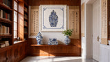 Front view of blue and white ceramic mosaic wall art in a white frame