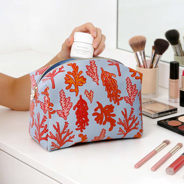 Light blue vegan leather cosmetic bag with coral printing pattern