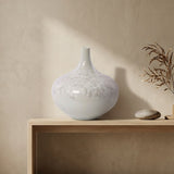 Side view of handcrafted crystalline flat-belly vase showing dynamic glaze patterns