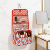 Ladies coral pattern hanging makeup organizer with clear pockets