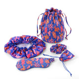 Luxury travel beauty and sleep essentials gift set in coral print quilted cotton