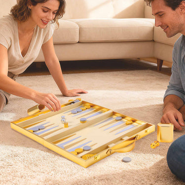 Elegant backgammon set with a gold case, gold dice cups, and metallic gold and silver dices