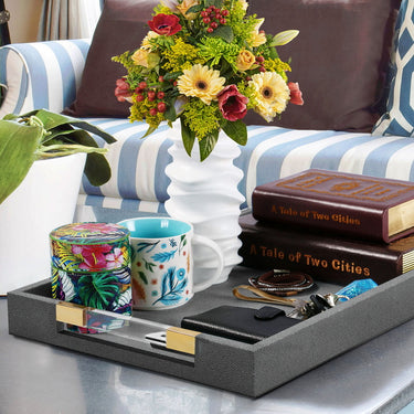 Handmade black ottoman trays with clear acrylic sides and gold accents