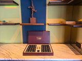 open burgundy mahjong case displayed disply in hotel club