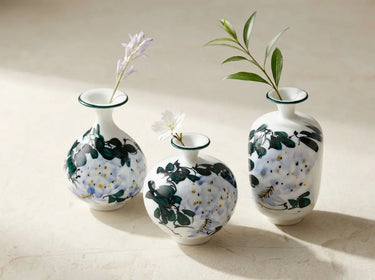 Set of three Wisteria Reverie hand-painted porcelain mini bud vases set of 3 in varied rounded silhouettes