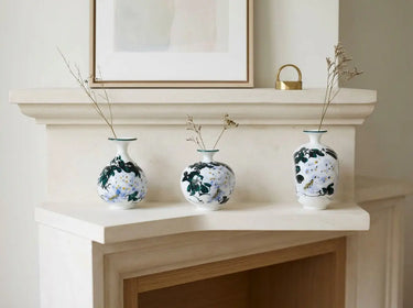 Wisteria Reverie hand-painted porcelain mini bud vases in varied rounded silhouettes